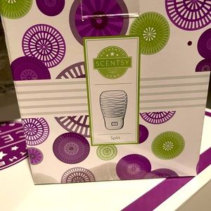 Scentcy Wall Fan Diffuser I have two but two different designs -star and spin